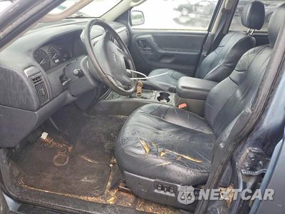 Zdjęcie 7 z 13 samochodu: 2002 JEEP GRAND CHEROKEE LAREDO VIN:1J4GW48S32C254646 - miniatura