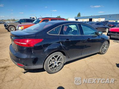 Trzecie zdjęcie samochodu z tyłu: 2017 FORD FOCUS SEL VIN:1FADP3H28HL295210 - miniatura