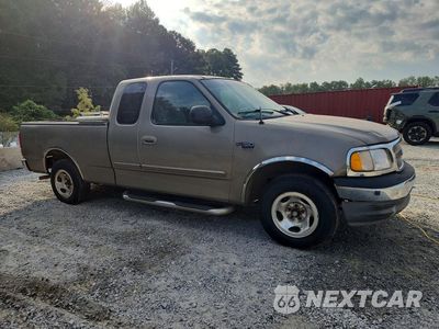 Czwarte zdjęcie samochodu z boku: 2003 FORD F-150 VIN:1FTRX17W33NB42823 - miniatura