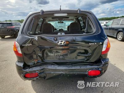 Zdjęcie 6 z 13 samochodu: 2004 HYUNDAI SANTA FE GLS VIN:KM8SC13D54U739170 - miniatura