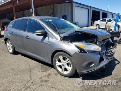 Czwarte zdjęcie samochodu z boku: 2014 FORD FOCUS SE VIN:1FADP3K22EL452539 - miniatura