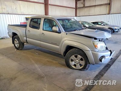 Czwarte zdjęcie samochodu z boku: 2011 TOYOTA TACOMA DOUBLE CAB LONG BED VIN:3TMMU4FN9BM028024 - miniatura