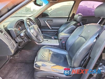 Zdjęcie 7 z 12 samochodu: 2004 INFINITI FX45 BASE VIN:JNRBS08W94X400924 - miniatura