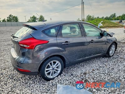 Trzecie zdjęcie samochodu z tyłu: 2018 FORD FOCUS SE VIN:1FADP3K28JL218187 - miniatura