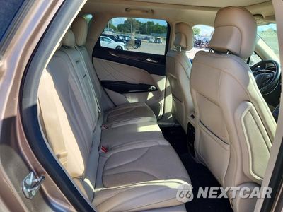 Zdjęcie 10 z 12 samochodu: 2018 LINCOLN MKC RESERVE VIN:5LMTJ3DH4JUL28522 - miniatura