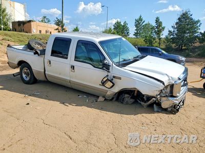 Czwarte zdjęcie samochodu z boku: 2002 FORD F250 SUPER DUTY VIN:1FTNW20F82EA02458 - miniatura