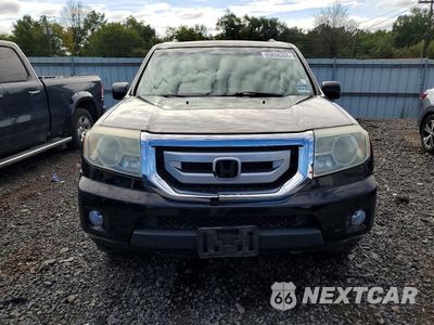 Piąte zdjęcie samochodu w środku: 2011 HONDA PILOT EXL VIN:5FNYF4H69BB013092 - miniatura