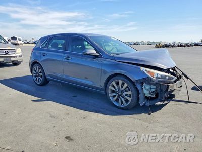 Czwarte zdjęcie samochodu z boku: 2018 HYUNDAI ELANTRA GT SPORT VIN:KMHH55LC5JU039969 - miniatura