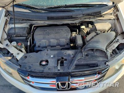 Zdjęcie 12 z 13 samochodu: 2014 HONDA ODYSSEY TOURING VIN:5FNRL5H91EB097300 - miniatura