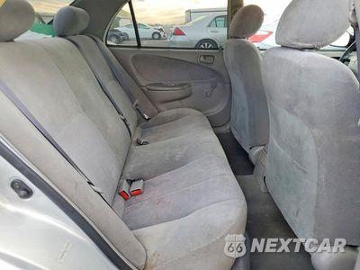 Zdjęcie 10 z 12 samochodu: 2001 TOYOTA COROLLA CE VIN:1NXBR12E31Z426901 - miniatura