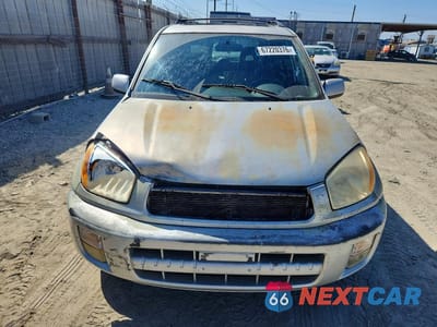 Piąte zdjęcie samochodu w środku: 2003 TOYOTA RAV4 BASE VIN:JTEGH20V430089750 - miniatura