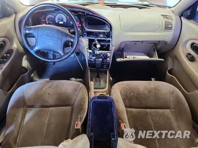 Zdjęcie 8 z 12 samochodu: 2002 KIA SPECTRA BASE VIN:KNAFB121925129082 - miniatura