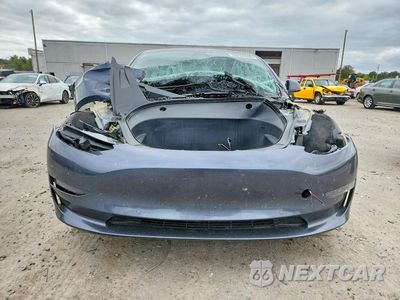 Piąte zdjęcie samochodu w środku: 2021 TESLA MODEL 3 VIN:5YJ3E1ECXMF083354 - miniatura