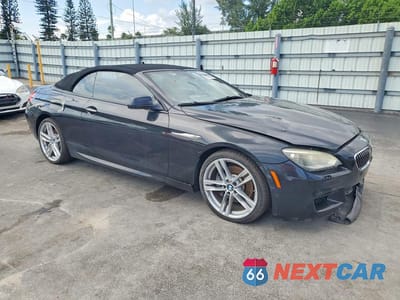 Czwarte zdjęcie samochodu z boku: 2014 BMW 640 I VIN:WBALW7C59EDX59092 - miniatura