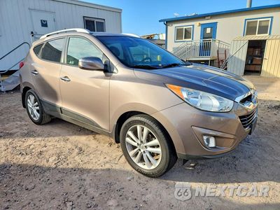 Czwarte zdjęcie samochodu z boku: 2012 HYUNDAI TUCSON LIMITED VIN:KM8JU3AC2CU488024 - miniatura