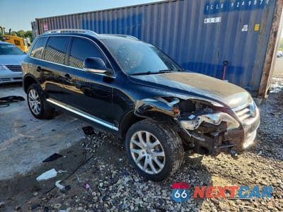 Czwarte zdjęcie samochodu z boku: 2008 VOLKSWAGEN TOUAREG 2 V6 VIN:WVGBE77L38D008144 - miniatura