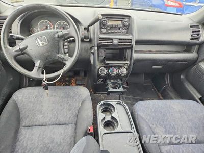 Zdjęcie 8 z 12 samochodu: 2006 HONDA CR-V LX VIN:JHLRD78576C042535 - miniatura