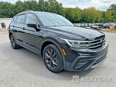 Czwarte zdjęcie samochodu z boku: 2023 VOLKSWAGEN TIGUAN SE VIN:3VV3B7AX0PM115377 - miniatura