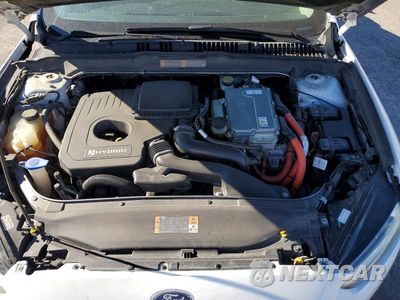 Zdjęcie 11 z 12 samochodu: 2013 FORD FUSION SE HYBRID VIN:3FA6P0LU6DR371387 - miniatura