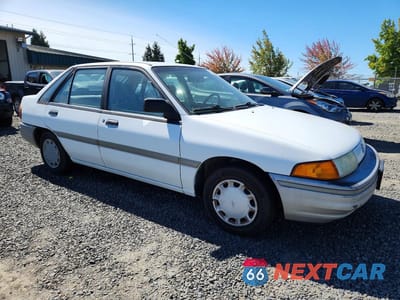 Czwarte zdjęcie samochodu z boku: 1991 FORD ESCORT LX VIN:1FAPP14J1MW284363 - miniatura