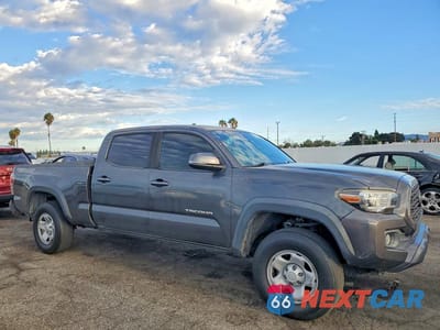 Czwarte zdjęcie samochodu z boku: 2020 TOYOTA TACOMA TRD OFF-ROAD VIN:3TMDZ5BN5LM092124 - miniatura