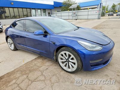 Czwarte zdjęcie samochodu z boku: 2021 TESLA MODEL 3 VIN:5YJ3E1EB2MF057175 - miniatura