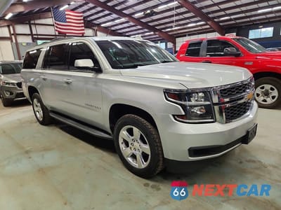 Czwarte zdjęcie samochodu z boku: 2015 CHEVROLET SUBURBAN K1500 LT VIN:1GNSKJKC0FR742247 - miniatura