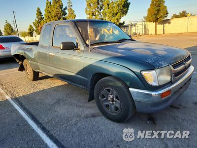 Czwarte zdjęcie samochodu z boku: 1997 TOYOTA TACOMA BASE VIN:4TAVL52N0VZ308173 - miniatura
