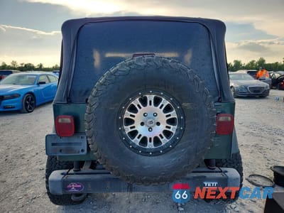 Zdjęcie 7 z 13 samochodu: 2000 JEEP WRANGLER SAHARA VIN:1J4FA59S8YP728946 - miniatura