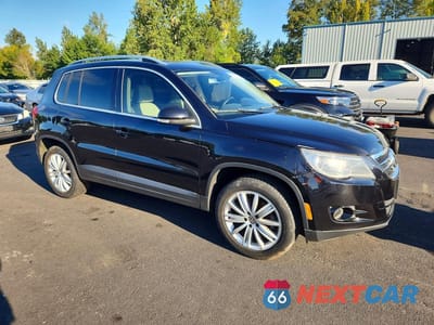 Czwarte zdjęcie samochodu z boku: 2009 VOLKSWAGEN TIGUAN S VIN:WVGAV75N09W502662 - miniatura