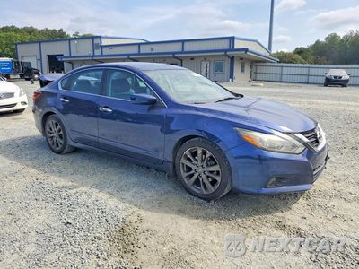 Czwarte zdjęcie samochodu z boku: 2018 NISSAN ALTIMA 2.5 SR VIN:1N4AL3AP3JC221123 - miniatura