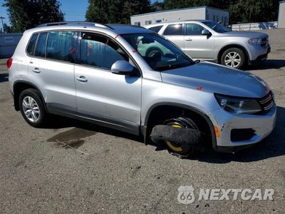 Czwarte zdjęcie samochodu z boku: 2017 VOLKSWAGEN TIGUAN S VIN:WVGBV7AXXHK027538 - miniatura