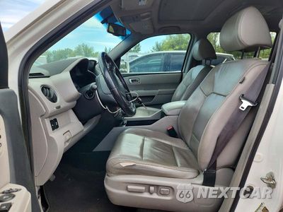 Zdjęcie 7 z 13 samochodu: 2014 HONDA PILOT TOURING VIN:5FNYF4H9XEB017165 - miniatura