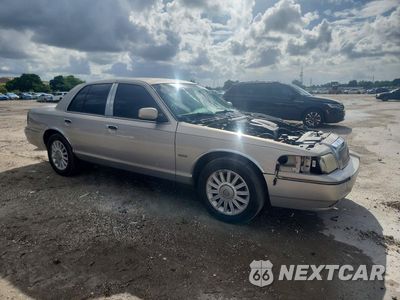 Czwarte zdjęcie samochodu z boku: 2010 MERCURY GRAND MARQUIS LS VIN:2MEBM7FVXAX606917 - miniatura