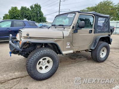 2004 JEEP WRANGLER / TJ SAHARA 1J4FA59S74P716202 - główne zdjęcie licytacji z USA - miniatura