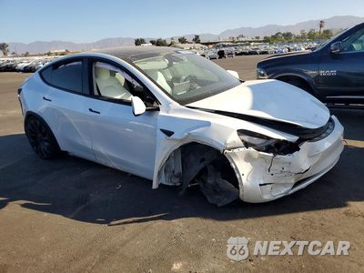 Czwarte zdjęcie samochodu z boku: 2021 TESLA MODEL Y VIN:5YJYGDEFXMF263414 - miniatura