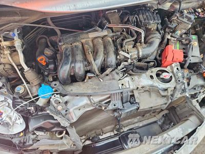 Zdjęcie 11 z 12 samochodu: 2018 HONDA FIT EX VIN:3HGGK5H89JM721353 - miniatura