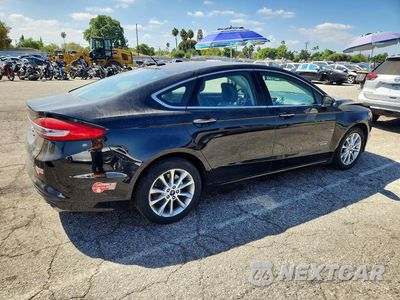 Trzecie zdjęcie samochodu z tyłu: 2017 FORD FUSION SE PHEV VIN:3FA6P0PU3HR379916 - miniatura