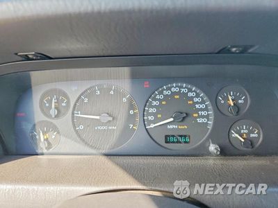 Zdjęcie 9 z 12 samochodu: 1999 JEEP GRAND CHEROKEE LAREDO VIN:1J4GW58S7XC752961 - miniatura