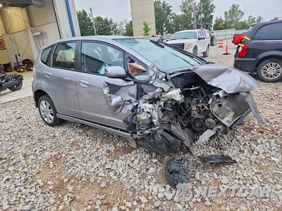 Czwarte zdjęcie samochodu z boku: 2010 HONDA FIT SPORT VIN:JHMGE8H47AS001009 - miniatura