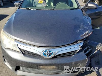 Zdjęcie 11 z 12 samochodu: 2012 TOYOTA CAMRY HYBRID LE VIN:4T1BD1FK5CU055807 - miniatura