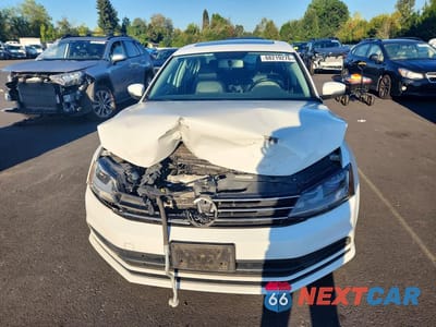 Piąte zdjęcie samochodu w środku: 2017 VOLKSWAGEN JETTA SE VIN:3VWDB7AJ1HM223830 - miniatura