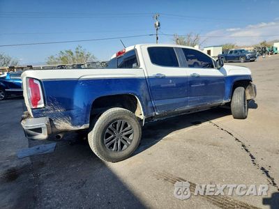 Trzecie zdjęcie samochodu z tyłu: 2016 GMC CANYON SLT VIN:1GTG6DE39G1196564 - miniatura