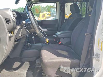Zdjęcie 7 z 13 samochodu: 2014 JEEP WRANGLER UNLIMITED SAHARA VIN:1C4BJWEG0EL206987 - miniatura
