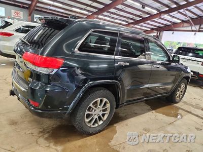Trzecie zdjęcie samochodu z tyłu: 2014 JEEP GRAND CHEROKEE OVERLAND VIN:1C4RJFCM1EC298229 - miniatura