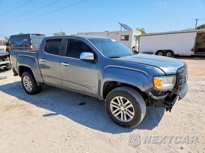 Czwarte zdjęcie samochodu z boku: 2019 GMC CANYON SLT VIN:1GTG6DENXK1284288 - miniatura