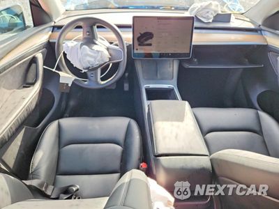 Zdjęcie 8 z 12 samochodu: 2023 TESLA MODEL Y VIN:7SAYGDEE7PA054160 - miniatura