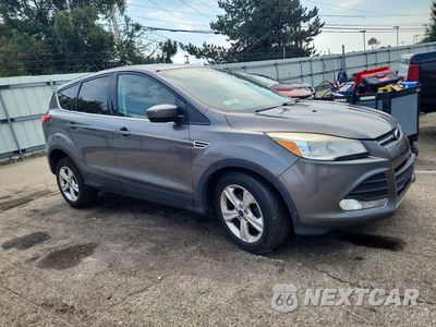 Czwarte zdjęcie samochodu z boku: 2014 FORD ESCAPE SE VIN:1FMCU0GX5EUC49331 - miniatura