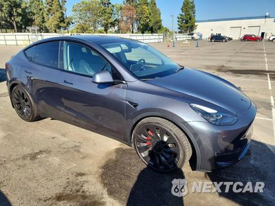 Czwarte zdjęcie samochodu z boku: 2023 TESLA MODEL Y VIN:7SAYGDEF5PF874152 - miniatura