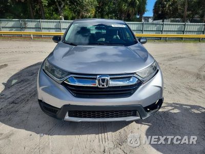Piąte zdjęcie samochodu w środku: 2019 HONDA CR-V LX VIN:2HKRW6H3XKH208058 - miniatura